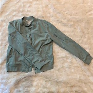 zip up teal jacket